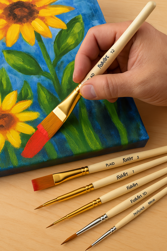 Detail shot of gold taklon and natural bristle brushes, emphasizing precision and durability.
