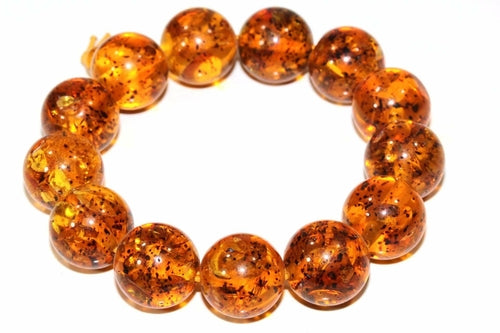 Chunky resin faux amber beads strung on a durable elastic band