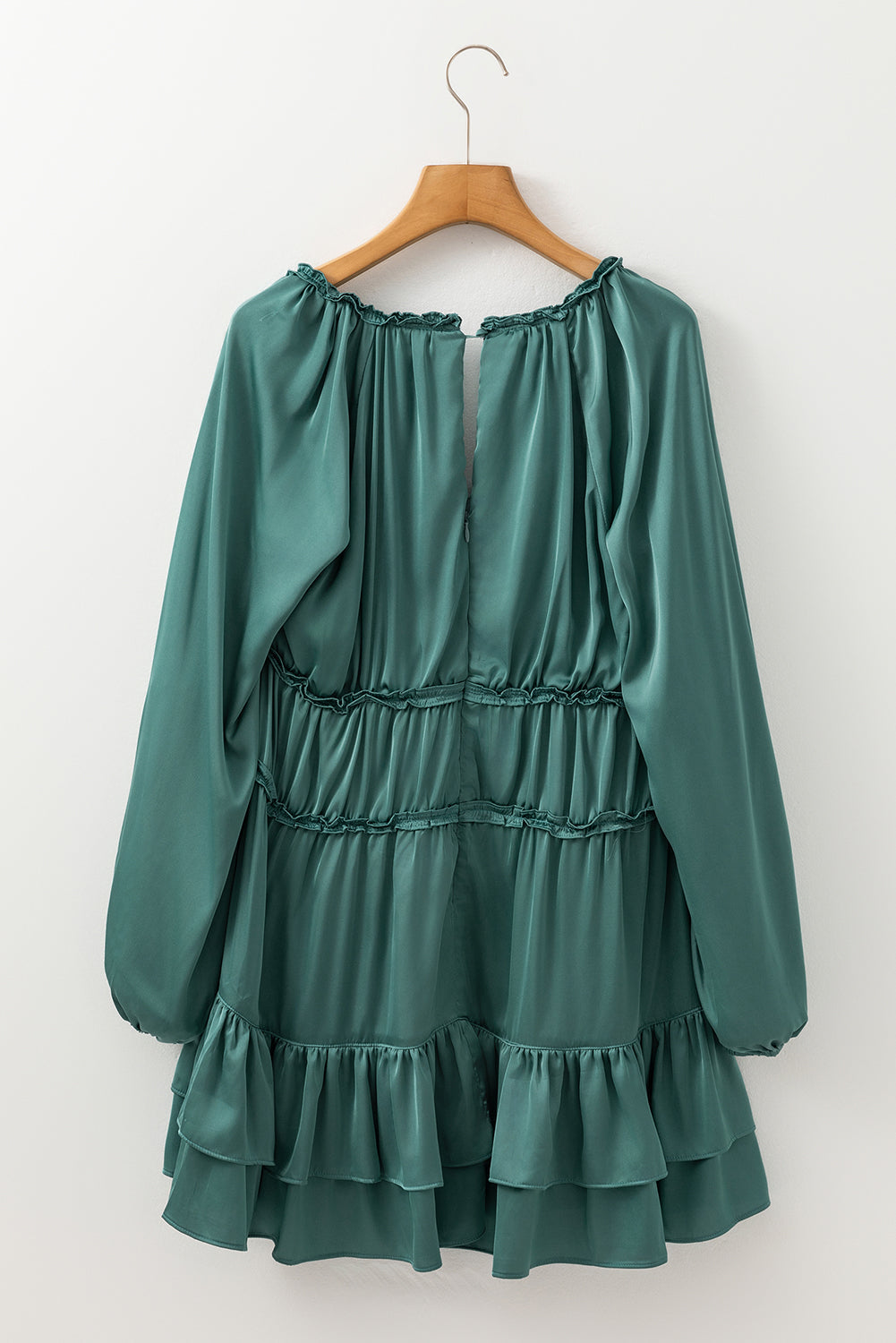 Elegant loose-fit dress featuring tiered ruffles and soft fabric