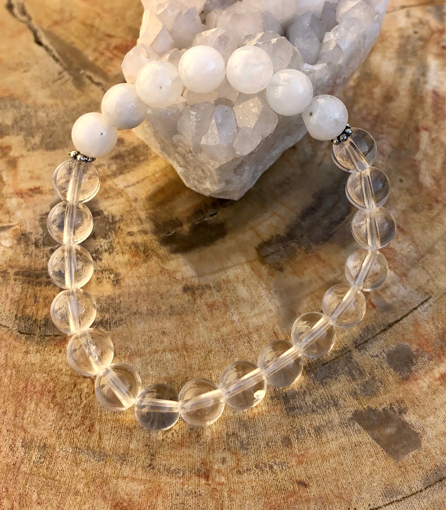 Hand wearing the bracelet, showcasing its elegant stretch fit.