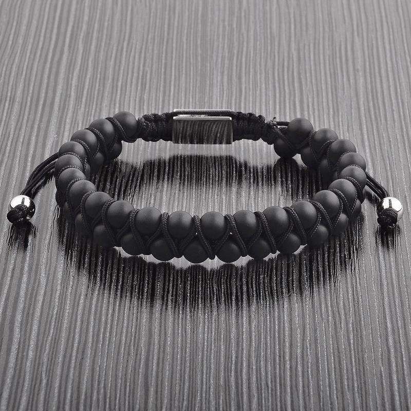 Minimalist men's bracelet with smooth matte black agate stones