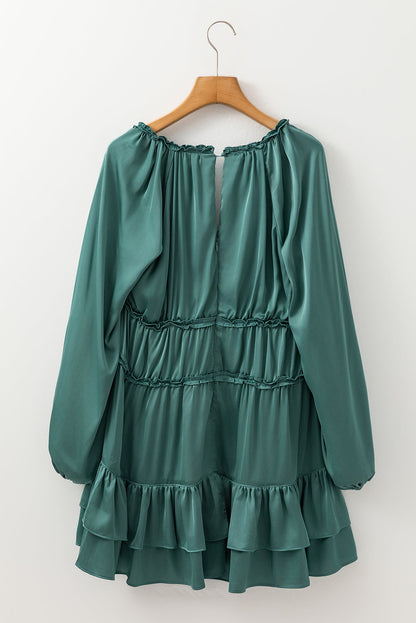 Elegant loose-fit dress featuring tiered ruffles and soft fabric