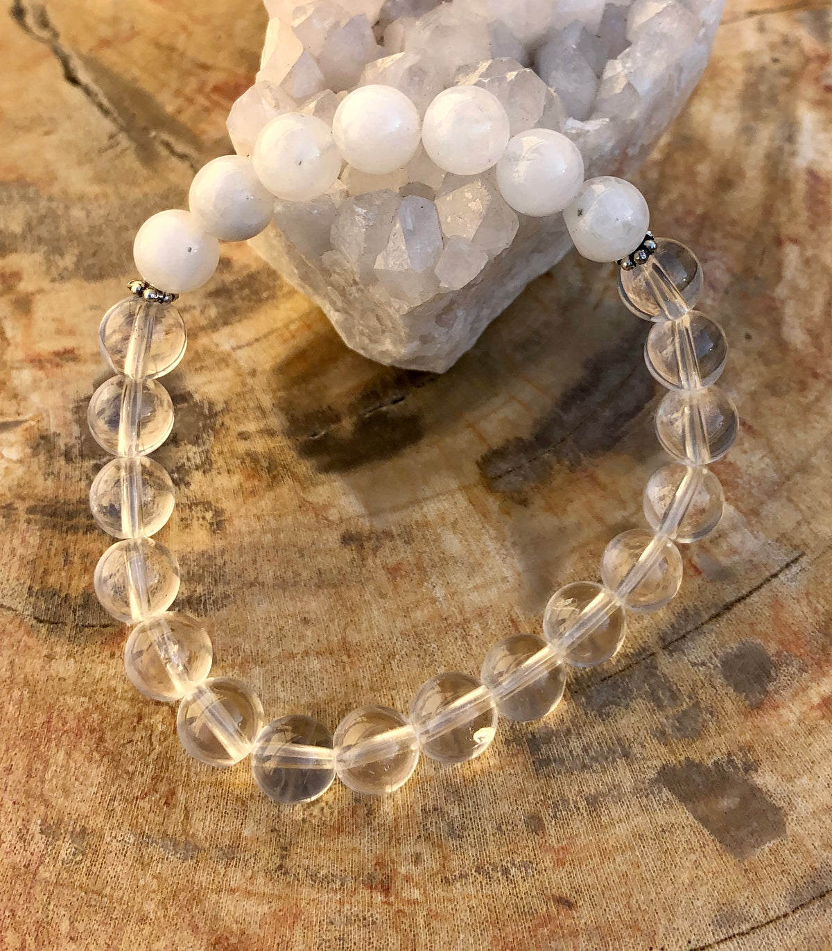 Hand wearing the bracelet, showcasing its elegant stretch fit.