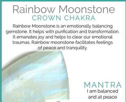 Rainbow Moonstone beads reflecting soft hues of blue and white under sunlight.