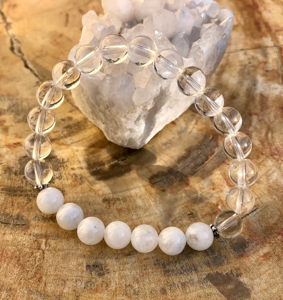 Close-up of Rainbow Moonstone & Crystal Quartz bracelet with iridescent glow.