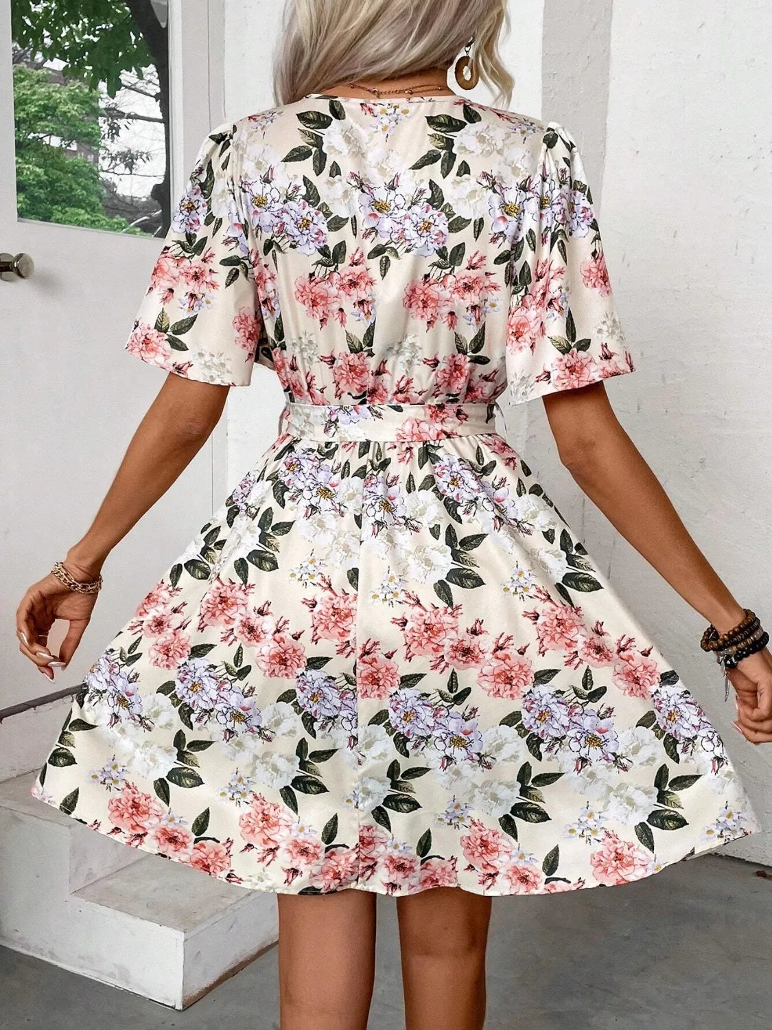 Elegant short-sleeve dress featuring lightweight, breathable fabric