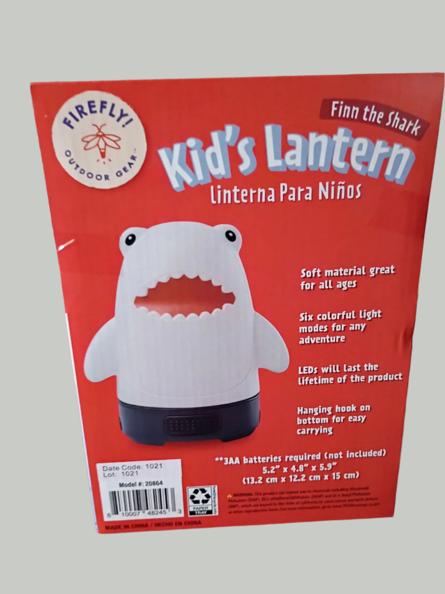 Red packaging of a shark-shaped children's lantern with text on a white background
