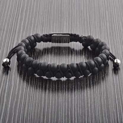 Minimalist men's bracelet with smooth matte black agate stones