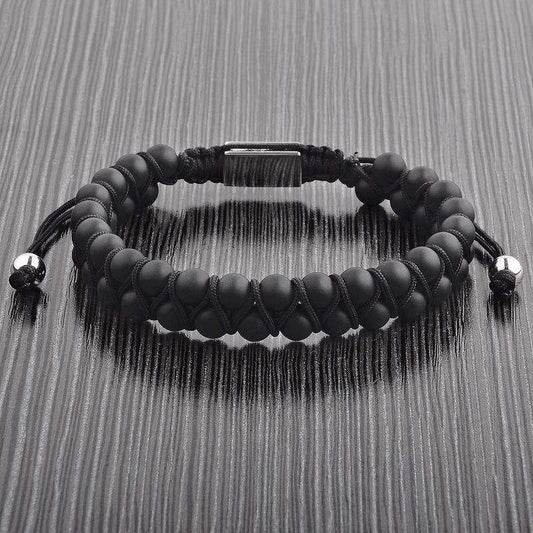Minimalist men's bracelet with smooth matte black agate stones